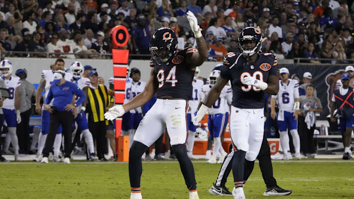 Aug 17, 2025; Chicago, Illinois, USA; Chicago Bears defensive end Austin Booker (94) celebrates after sacking Buffalo Bills quarterback Mike White (14) during the first half at Soldier Field. Mandatory Credit: David Banks-Imagn Images