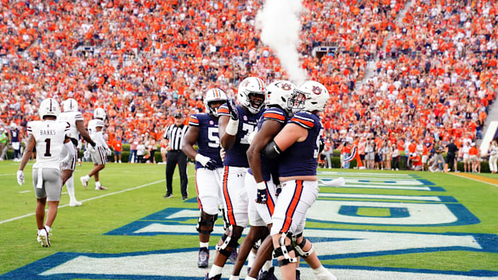Oct 28, 2023; Auburn, Alabama, USA; Auburn Tigers wide receiver Shane Hooks (3) celebrates his touchdown in the end zone with teammates against the Mississippi State Bulldogs during the first quarter at Jordan-Hare Stadium. Mandatory Credit: John David Mercer-USA TODAY Sports