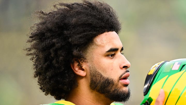 Dec 20, 2025; Eugene, OR, USA; Oregon Ducks quarterback Dante Moore (5) looks on before the game against the James Madison Dukes at Autzen Stadium. 