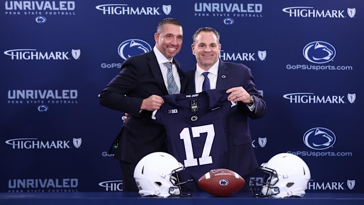 Dec 8, 2025; University Park, PA, USA; Matt Campbell, left,  and Penn State University athletic director Pat Kraft, right, pose for a photo after Matt Campbell is announced as the Penn State Nittany Lions new head coach during a press conference at the Beaver Stadium Press Room. Mandatory Credit: Matthew O'Haren-Imagn Images