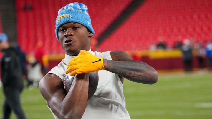 Dec 8, 2024; Kansas City, Missouri, USA; Los Angeles Chargers wide receiver DJ Chark Jr. (9) warms up against the Kansas City Chiefs prior to a game at GEHA Field at Arrowhead Stadium. Mandatory Credit: Denny Medley-Imagn Images