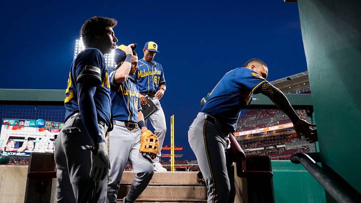 The Milwaukee Brewers return to the dugout after the eighth inning of the MLB National League Central game between the Cincinnati Reds and the Milwaukee Brewers at Great American Ball Park in downtown Cincinnati on Tuesday, June 23, 2026. The Reds dropped the series with a 2-0 loss to the Brewers. The Milwaukee Brewers return to the dugout after the eighth inning of the MLB National League Central game between the Cincinnati Reds and the Milwaukee Brewers at Great American Ball Park in downtown Cincinnati on Tuesday, June 23, 2026. The Reds dropped the series with a 2-0 loss to the Brewers.