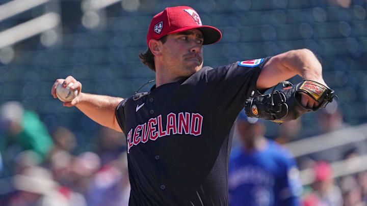 Mar 2, 2024; Goodyear, Arizona, USA; Cleveland Guardians starting pitcher Shane Bieber (57) pitches against the Kansas City Royals during the first inning at Goodyear Ballpark.