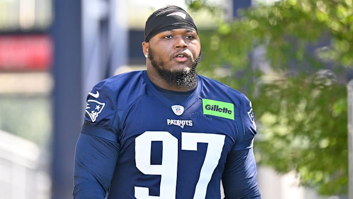 Jul 23, 2025; Foxborough, MA, USA; New England Patriots defensive end Milton Williams (97) walks to the practice field for training camp at Gillette Stadium. 