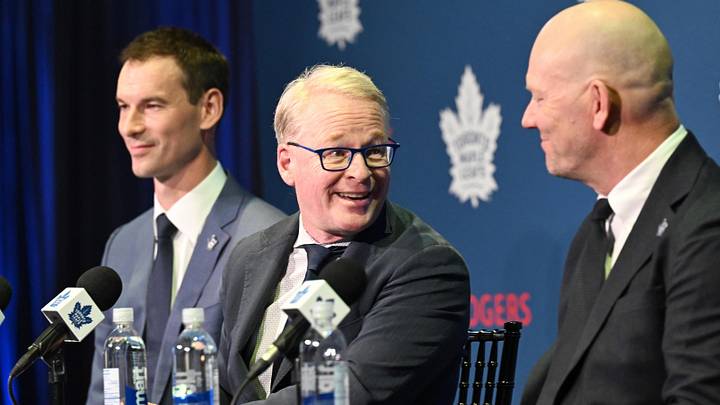 May 4, 2026; Toronto, Ontario, CANADA;  Maple Leafs Sports and Entertainment CEO Keith Pelley answers media questions between Toronto Maple Leafs general manager John Chayka (left) and senior executive advisor Mats Sundin during an introductory news conference at Real Sports Bar and Grill. Mandatory Credit: Dan Hamilton-Imagn Images