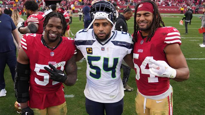 Dec 10, 2023; Santa Clara, California, USA; Seattle Seahawks linebacker Bobby Wagner (center) poses for a photo with San Francisco 49ers linebackers Dre Greenlaw (left) and linebacker Fred Warner (right) after the game at Levi's Stadium. Mandatory Credit: Darren Yamashita-USA TODAY Sports
