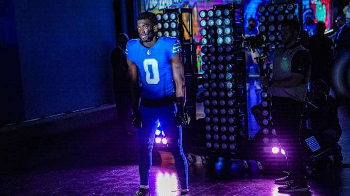 Detroit Lions cornerback Terrion Arnold (0) waits to run out of the tunnel at the start of the Thursday Night Football against the Green Bay Packers at Ford Field in Detroit on Thursday, Dec. 5, 2024.