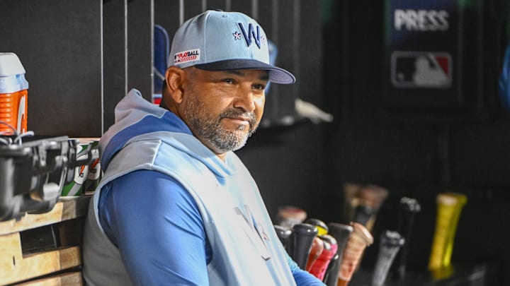 Jun 13, 2025; Washington, District of Columbia, USA; Washington Nationals manager Dave Martinez (4) in the dugout during the game against the Miami Marlins at Nationals Park.