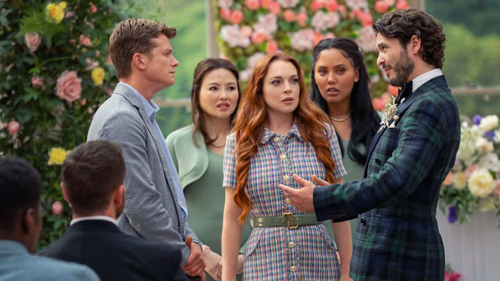 Irish Wish, (L to R) Ed Speleers as James Thomas, Elizabeth Tan as Emma Taylor, Lindsay Lohan as Maddie Kelly, Ayesha Curry as Heather, Alexander Vlahos as Paul Kennedy. Cr. Patrick Redmond / Netflix © 2024