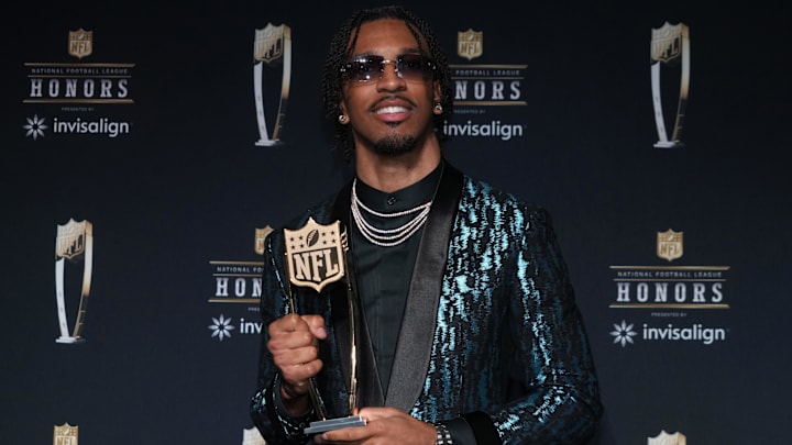 Feb 6, 2025; New Orleans, LA, USA; Washington Commanders quarterback Jayden Daniels poses with the Offensive Rookie of the Year award during Super Bowl LIX NFL Honors at Saenger Theatre. Mandatory Credit: Kirby Lee-Imagn Images