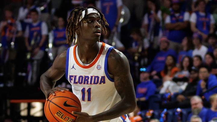 Dec 21, 2024; Gainesville, Florida, USA; Florida Gators guard Denzel Aberdeen (11) looks to pass against the North Florida Ospreys during the second half at Exactech Arena at the Stephen C. O'Connell Center. Mandatory Credit: Matt Pendleton-Imagn Images Dec 21, 2024; Gainesville, Florida, USA; Florida Gators guard Denzel Aberdeen (11) looks to pass against the North Florida Ospreys during the second half at Exactech Arena at the Stephen C. O'Connell Center. Mandatory Credit: Matt Pendleton-Imagn Images