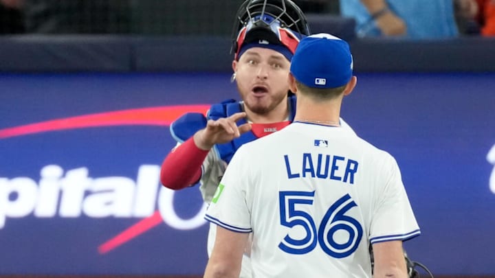Blue Jays catcher Alejandro Kirk and pitcher Eric Lauer celebrate after defeating the Los Angeles Dodgers in game one of the World Series at Rogers Centre. 