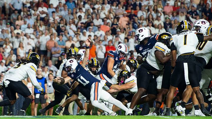 Auburn Tigers quarterback Jackson Arnold (11) stretches for the touchdown run as Auburn Tigers take on Missouri Tigers at Jordan-Hare Stadium in Auburn, Ala. on Saturday, Oct. 18, 2025. Auburn Tigers quarterback Jackson Arnold (11) stretches for the touchdown run as Auburn Tigers take on Missouri Tigers at Jordan-Hare Stadium in Auburn, Ala. on Saturday, Oct. 18, 2025.