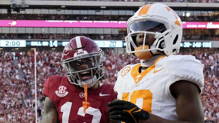 Oct 21, 2023; Tuscaloosa, Alabama, USA; Alabama Crimson Tide defensive back Malachi Moore (13) celebrates after a fourth down pass intended for Tennessee Volunteers running back Khalifa Keith (20) fell incomplete at Bryant-Denny Stadium. Alabama defeated Tennessee 34-20. Mandatory Credit: Gary Cosby Jr.-Imagn Images