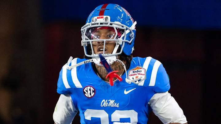 Jan 8, 2026; Glendale, AZ, USA; Mississippi Rebels cornerback Chris Graves Jr. (32) against the Miami Hurricanes during the 2026 Fiesta Bowl and semifinal game of the College Football Playoff at State Farm Stadium. Mandatory Credit: Mark J. Rebilas-Imagn Images Jan 8, 2026; Glendale, AZ, USA; Mississippi Rebels cornerback Chris Graves Jr. (32) against the Miami Hurricanes during the 2026 Fiesta Bowl and semifinal game of the College Football Playoff at State Farm Stadium. Mandatory Credit: Mark J. Rebilas-Imagn Images