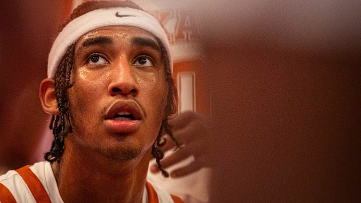 Texas Longhorns forward Devon Pryor (22) listens to coaching during a timeout in the second half of the Longhorns' game against the Chicago State Cougars at the Moody Center in Austin, Nov. 12, 2024. Texas Longhorns forward Devon Pryor (22) listens to coaching during a timeout in the second half of the Longhorns' game against the Chicago State Cougars at the Moody Center in Austin, Nov. 12, 2024.