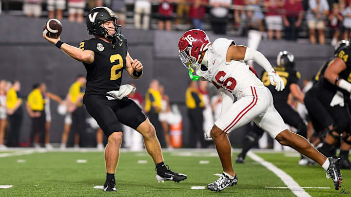 Vanderbilt Commodores quarterback Diego Pavia (2) throws the ball against Alabama Crimson Tide defensive back Red Morgan (16) 