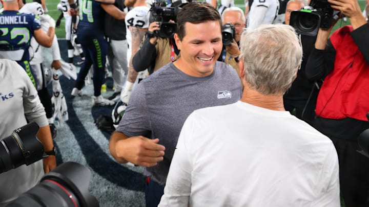 Aug 7, 2025; Seattle, Washington, USA; Seattle Seahawks head coach Mike Macdonald and Las Vegas Raiders head coach Pete Carroll after the game at Lumen Field. 