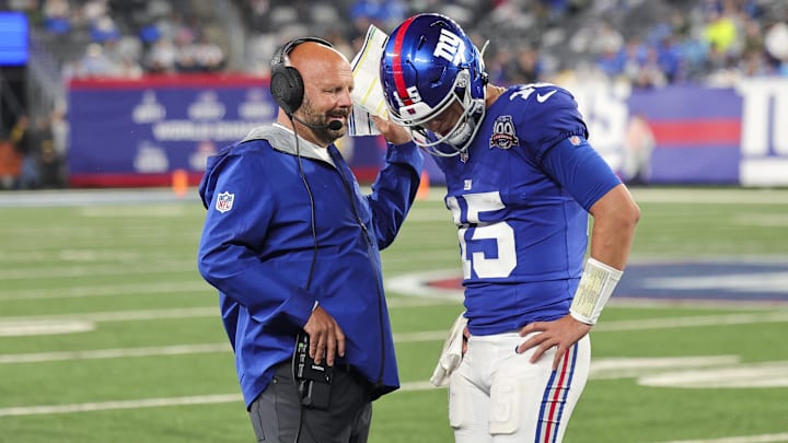 Aug 8, 2024; East Rutherford, New Jersey, USA; New York Giants quarterback Tommy DeVito (15) discusses the next play with New York Giants head coach Brian Daboll during the game against the Detroit Lions at MetLife Stadium. Aug 8, 2024; East Rutherford, New Jersey, USA; New York Giants quarterback Tommy DeVito (15) discusses the next play with New York Giants head coach Brian Daboll during the game against the Detroit Lions at MetLife Stadium.