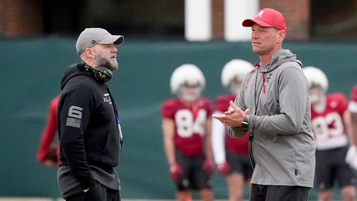 Mar 5, 2025; Tuscaloosa, AL, USA; Offensive coordinator Ryan Grubb and head coach Kalen DeBoer talk during Spring Practice for the Crimson Tide.