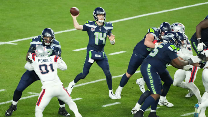 Feb 8, 2026; Santa Clara, CA, USA; Seattle Seahawks quarterback Sam Darnold (14) throws a pass against the New England Patriots in the second half in Super Bowl LX at Levi's Stadium. 