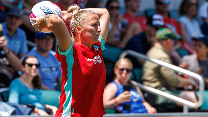 May 11, 2025; Kansas City, Missouri, USA; Kansas City Current defender Hailie Mace (4) inbounds the ball during the second half against the Bay FC at CPKC Stadium. Mandatory Credit: William Purnell-Imagn Images
