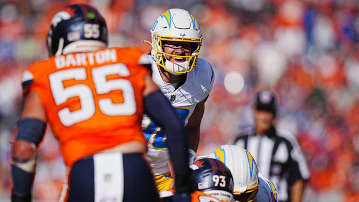 Oct 13, 2024; Denver, Colorado, USA; Los Angeles Chargers quarterback Justin Herbert (10) calls out in the second quarter against the Denver Broncos at Empower Field at Mile High. 