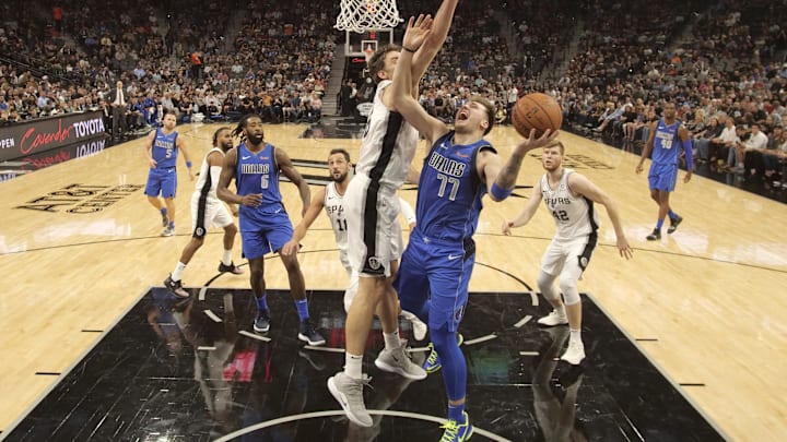 Oct 29, 2018; San Antonio, TX, USA: Dallas Mavericks guard Luka Doncic (77) shoots the ball as San Antonio Spurs center Pau Gasol (left) defends during the second half at AT&T Center. Mandatory Credit: Soobum Im-Imagn Images Oct 29, 2018; San Antonio, TX, USA: Dallas Mavericks guard Luka Doncic (77) shoots the ball as San Antonio Spurs center Pau Gasol (left) defends during the second half at AT&T Center. Mandatory Credit: Soobum Im-Imagn Images