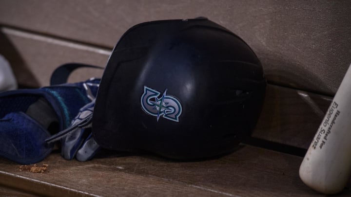 A view of a Seattle Mariners batting helmet and logo during the game between the Texas Rangers and the Seattle Mariners in June 2022. A view of a Seattle Mariners batting helmet and logo during the game between the Texas Rangers and the Seattle Mariners in June 2022.