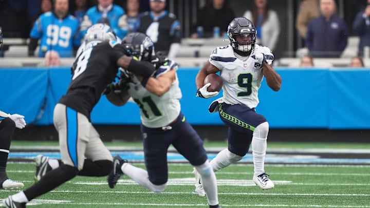 Seattle Seahawks running back Kenneth Walker III (9) runs the ball against Carolina Panthers