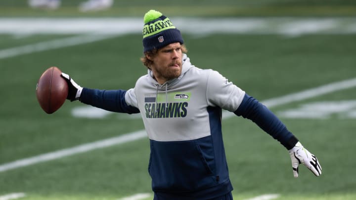 Jan 9, 2021; Seattle, Washington, USA; Seattle Seahawks tight end Greg Olsen (88) warms up prior to a game against the Los Angeles Rams at Lumen Field. Mandatory Credit: Steven Bisig-USA TODAY Sports