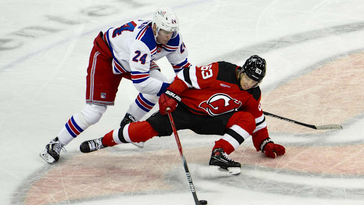 Feb 22, 2024; Newark, New Jersey, USA; New York Rangers right wing Kaapo Kakko (24) checks New