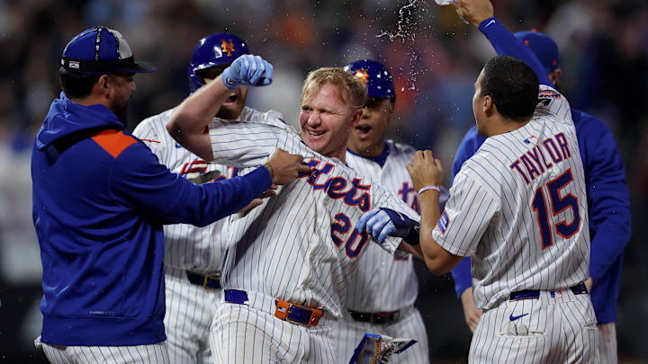 May 12, 2025; New York City, New York, USA; New York Mets first baseman Pete Alonso (20) celebrates with teammates after his ninth inning walkoff RBI sacrifice fly against the Pittsburgh Pirates at Citi Field. Mandatory Credit: Brad Penner-Imagn Images May 12, 2025; New York City, New York, USA; New York Mets first baseman Pete Alonso (20) celebrates with teammates after his ninth inning walkoff RBI sacrifice fly against the Pittsburgh Pirates at Citi Field. Mandatory Credit: Brad Penner-Imagn Images