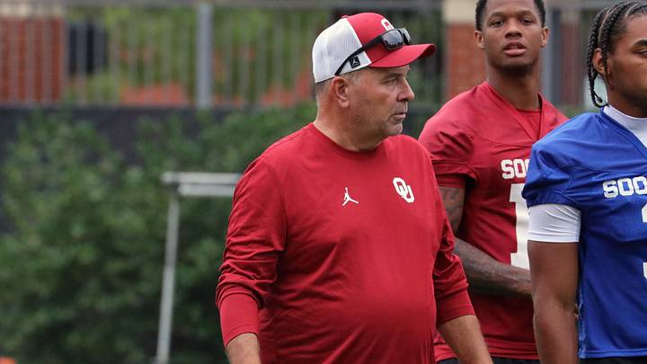 Oklahoma offensive assistant Kevin Wilson looks on at one of the Sooners' practices. Oklahoma offensive assistant Kevin Wilson looks on at one of the Sooners' practices.