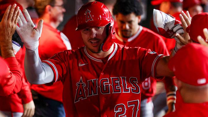 Sep 23, 2026; West Sacramento, California, USA; Los Angeles Angels designated hitter Mike Trout (27) celebrates in the dugout with teammates after hitting a one run home run during the fourth inning against the Athletics at Sutter Health Park. Mandatory Credit: Sergio Estrada-Imagn Images Sep 23, 2026; West Sacramento, California, USA; Los Angeles Angels designated hitter Mike Trout (27) celebrates in the dugout with teammates after hitting a one run home run during the fourth inning against the Athletics at Sutter Health Park. Mandatory Credit: Sergio Estrada-Imagn Images