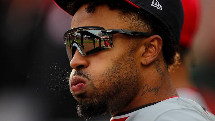 Mar 30, 2024; Cincinnati, Ohio, USA; Washington Nationals shortstop Nasim Nunez (26) sits in the dugout during the fifth inning in the game against the Cincinnati Reds at Great American Ball Park. Mandatory Credit: Katie Stratman-USA TODAY Sports