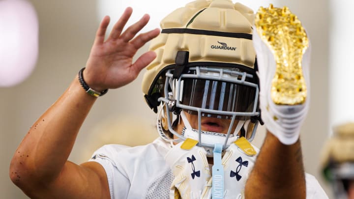 Notre Dame wide receiver Jaden Greathouse warms up during a Notre Dame football practice at Irish Athletic Center on Thursday, Aug. 1, 2024, in South Bend. Notre Dame wide receiver Jaden Greathouse warms up during a Notre Dame football practice at Irish Athletic Center on Thursday, Aug. 1, 2024, in South Bend.