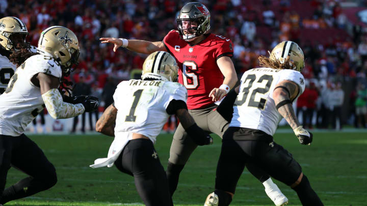 Tampa Bay Buccaneers quarterback Baker Mayfield (6) throws the ball under pressure from the New Orleans Saints defense