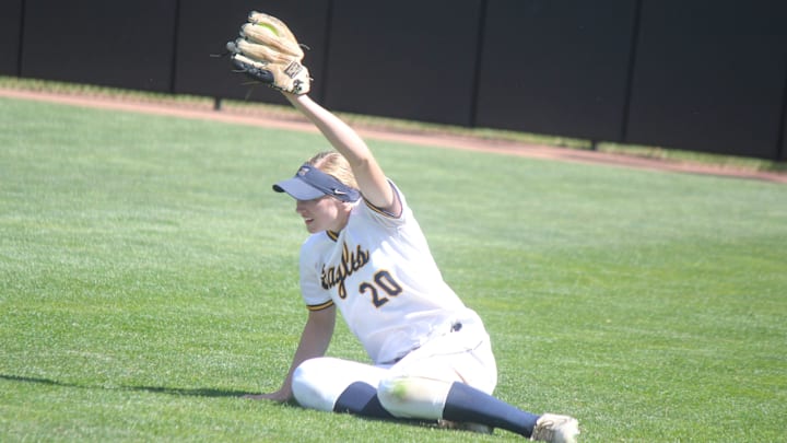 Right fielder Ava Gardner signals that she made a rally-stopping catch during the Eagles’ 5-0 win over Lake Orion in the Division 1 softball championship at Secchia Stadium in East Lansing on Saturday, June 15, 2024.