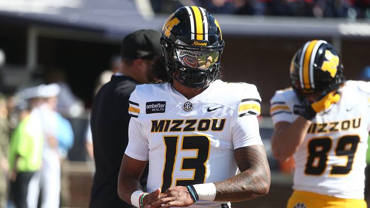 Oct 17, 2026; Oxford, Mississippi, USA;  Missouri Tigers quarterback Austin Simmons (13) warms up before the game against the Mississippi Rebels at Vaught-Hemingway Stadium.  Mandatory Credit: Petre Thomas-Imagn Images