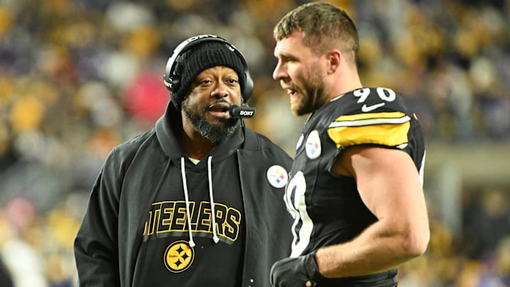 Pittsburgh Steelers head coach Mike Tomlin speaks with Pittsburgh Steelers linebacker T.J. Watt (90) during the second quarter against the Buffalo Bills at Acrisure Stadium. 