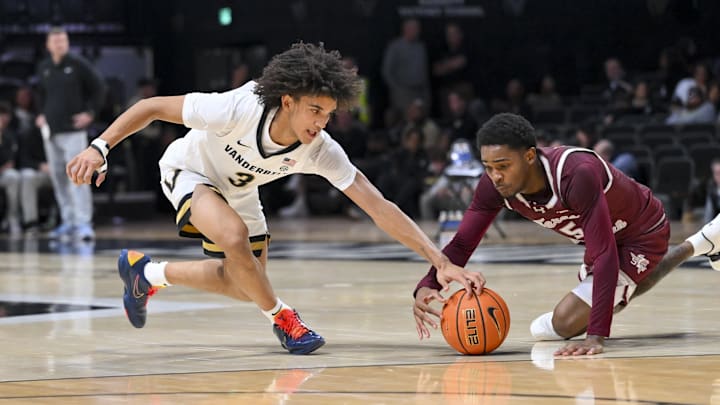 Nov 20, 2025; Nashville, Tennessee, USA;  Vanderbilt Commodores guard Tyler Tanner (3) steals the ball from Texas Southern Tigers guard Jaylen Wysinger (5) during the first half at Memorial Gymnasium. Mandatory Credit: Steve Roberts-Imagn Images