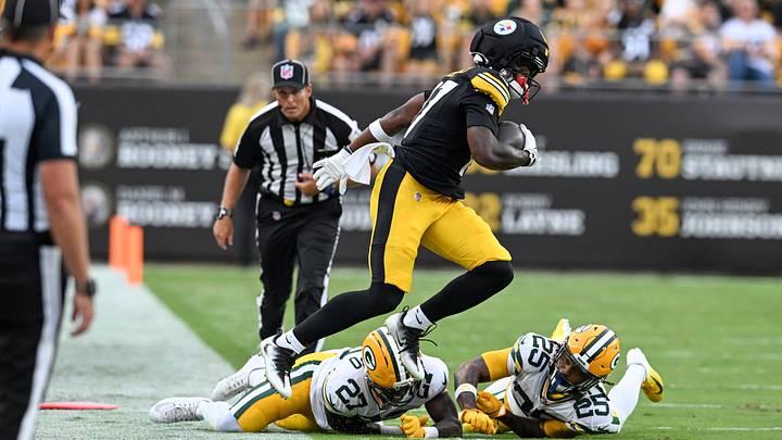 Aug 13, 2026; Pittsburgh, Pennsylvania, USA; Pittsburgh Steelers wide receiver Germie Bernard (17) jumps over Green Bay Packers safety Kitan Oladapo (27) during the first half of a game against the Green Bay Packers at Acrisure Stadium. Aug 13, 2026; Pittsburgh, Pennsylvania, USA; Pittsburgh Steelers wide receiver Germie Bernard (17) jumps over Green Bay Packers safety Kitan Oladapo (27) during the first half of a game against the Green Bay Packers at Acrisure Stadium.