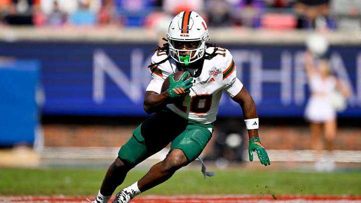 Nov 1, 2025; Dallas, Texas, USA; Miami Hurricanes wide receiver Malachi Toney (10) runs with the ball against the SMU Mustangs during the second half at Gerald J. Ford Stadium. Mandatory Credit: Jerome Miron-Imagn Images Nov 1, 2025; Dallas, Texas, USA; Miami Hurricanes wide receiver Malachi Toney (10) runs with the ball against the SMU Mustangs during the second half at Gerald J. Ford Stadium. Mandatory Credit: Jerome Miron-Imagn Images