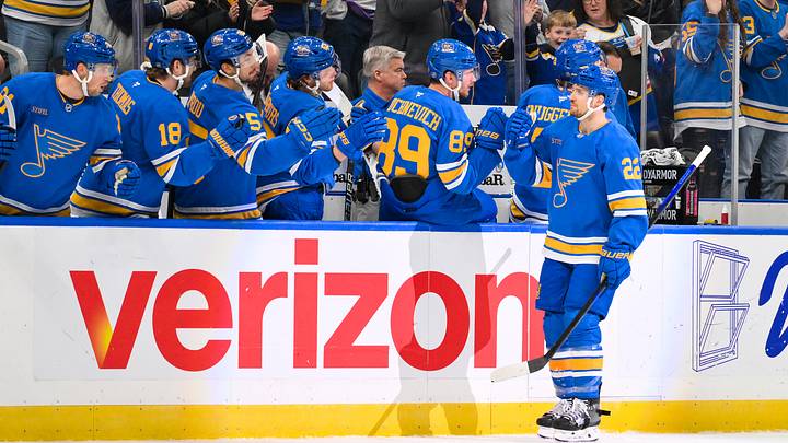Mar 13, 2026; St. Louis, Missouri, USA; St. Louis Blues center Pius Suter (22) is congratulated by teammates after scoring against the Edmonton Oilers during the third period at Enterprise Center. Mandatory Credit: Jeff Curry-Imagn Images