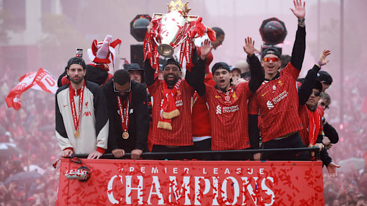 [US, Mexico & Canada customers only] May 26, 2025; Liverpool, UNITED KINGDOM;  Liverpool players Mohamed Salah, Dominik Szoboszlai, Luis Diaz and Darwin Nunez celebrate with the trophy on the bus during the Liverpool football club victory parade. Mandatory Credit: Phil Noble/Reuters via Imagn Images