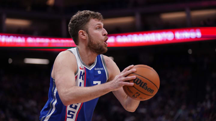 Apr 14, 2024; Sacramento, California, USA; Sacramento Kings forward Sasha Vezenkov (7) looks to shoot the ball against the Portland Trail Blazers in the fourth quarter at the Golden 1 Center. Mandatory Credit: Cary Edmondson-USA TODAY Sports