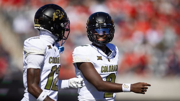Oct 19, 2024; Tucson, Arizona, USA; Colorado Buffalos quarterback Shedeur Sanders (2) with wide receiver Travis Hunter (12) against the Arizona Wildcats at Arizona Stadium. Mandatory Credit: Mark J. Rebilas-Imagn Images