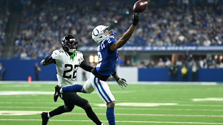 Dec 28, 2025; Indianapolis, Indiana, USA; Indianapolis Colts wide receiver Josh Downs (2) attempts to catch a pass against Jacksonville Jaguars cornerback Jarrian Jones (22) during the first half at Lucas Oil Stadium. Mandatory Credit: Robert Goddin-Imagn Images Dec 28, 2025; Indianapolis, Indiana, USA; Indianapolis Colts wide receiver Josh Downs (2) attempts to catch a pass against Jacksonville Jaguars cornerback Jarrian Jones (22) during the first half at Lucas Oil Stadium. Mandatory Credit: Robert Goddin-Imagn Images