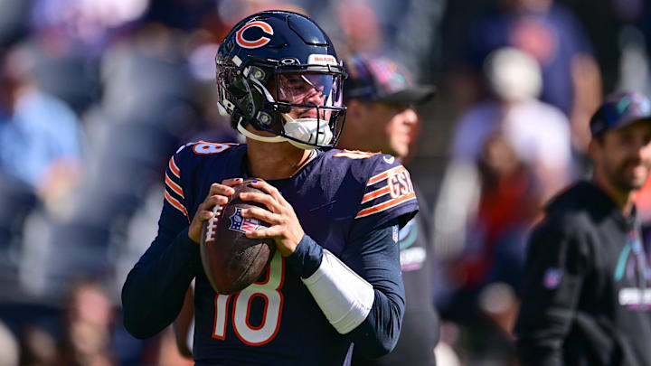 Oct 6, 2024; Chicago, Illinois, USA; Chicago Bears quarterback Caleb Williams (18) warms up before the game against the Carolina Panthers at Soldier Field. Mandatory Credit: Daniel Bartel-Imagn Images